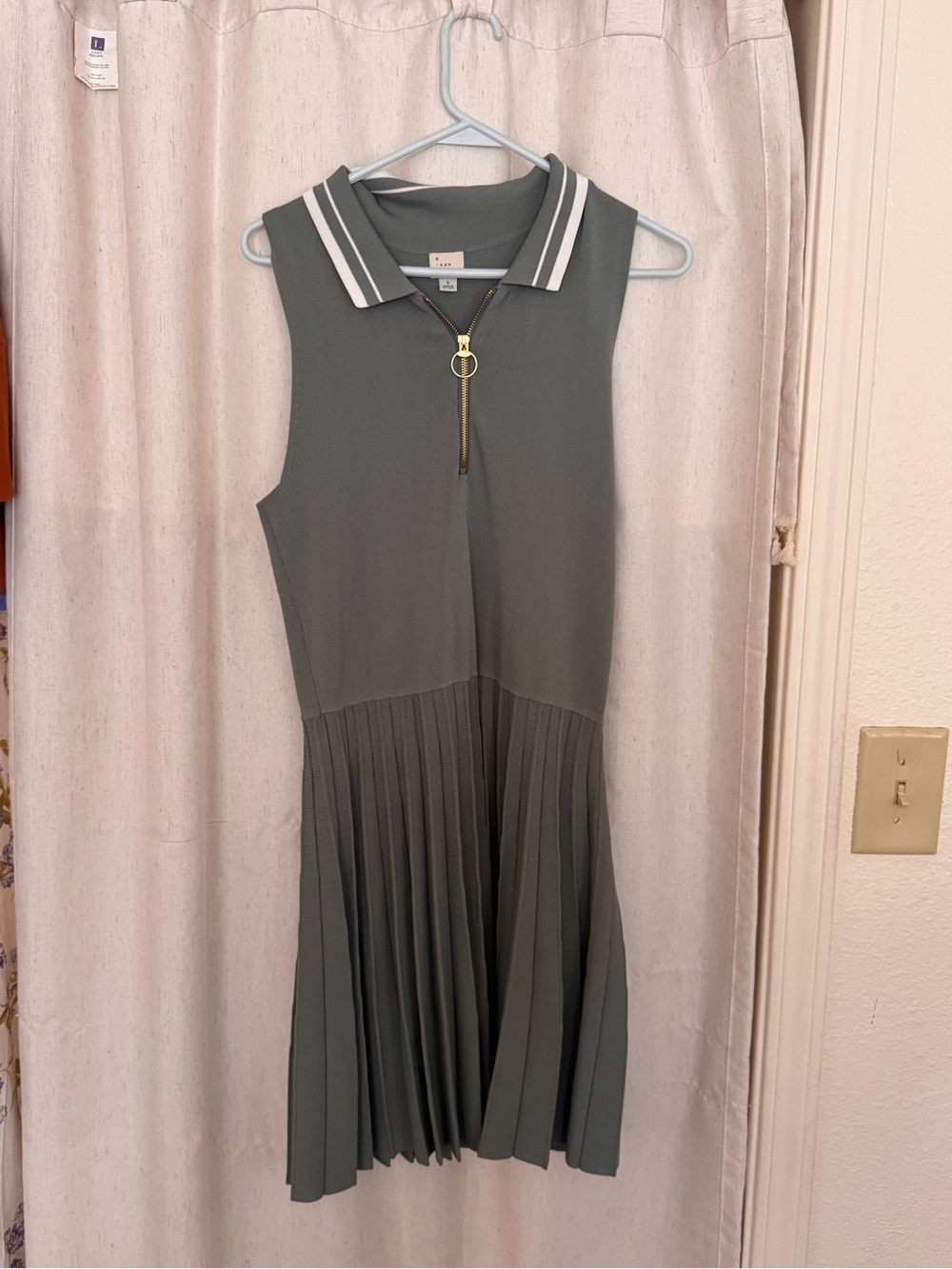 Sleeveless Pleated Polo Dress with Zip